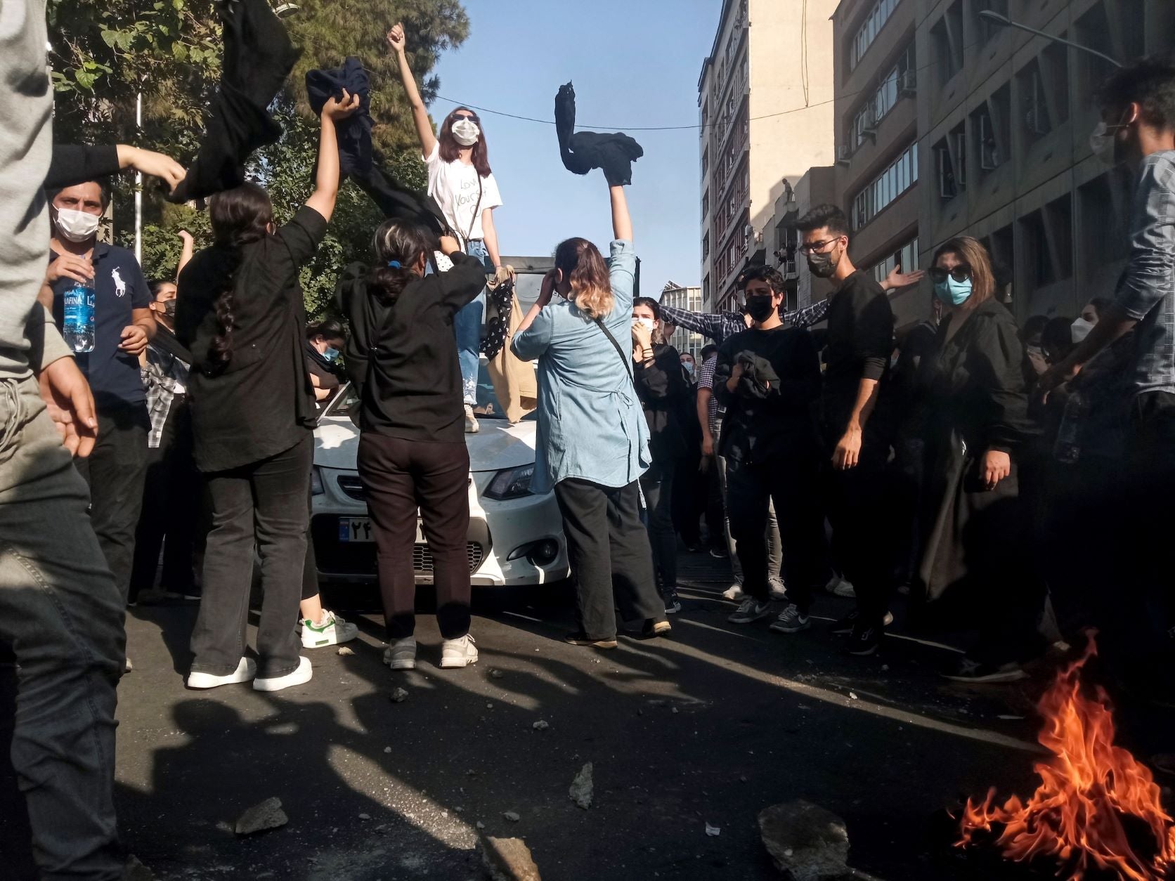 Iranian women on October 1, 2022, protest the death of Mahsa (Jina) Amini after she was detained by the morality police, in Tehran.