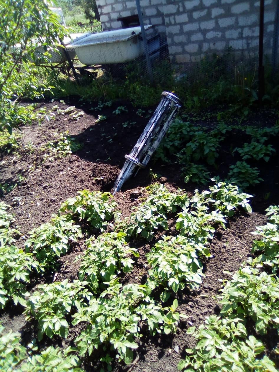 The carrier section of an 9M27K-series Uragan rocket that landed outside the home of a woman living on left bank of the Siverskiy Donets River while Russian forces occupied the area in 2022.  Each rocket delivers 30 9N210 or 9N235 submunitions. 