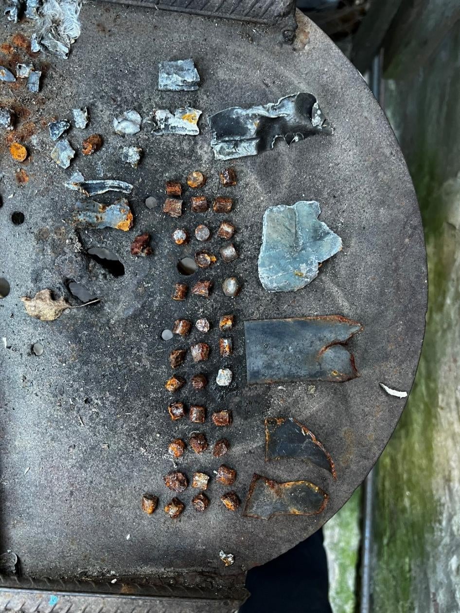 Remnants of 9N210 or 9N235 fragmentation submunitions that a family living on the right bank of the Siverskiy Donets River collected from their garden while Russian forces occupied the area in 2022.  